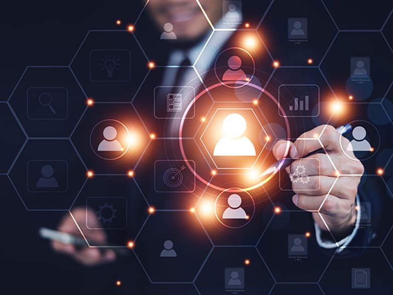 Business professional interacting with digital network interface representing user data, secure access control, and identity management systems.